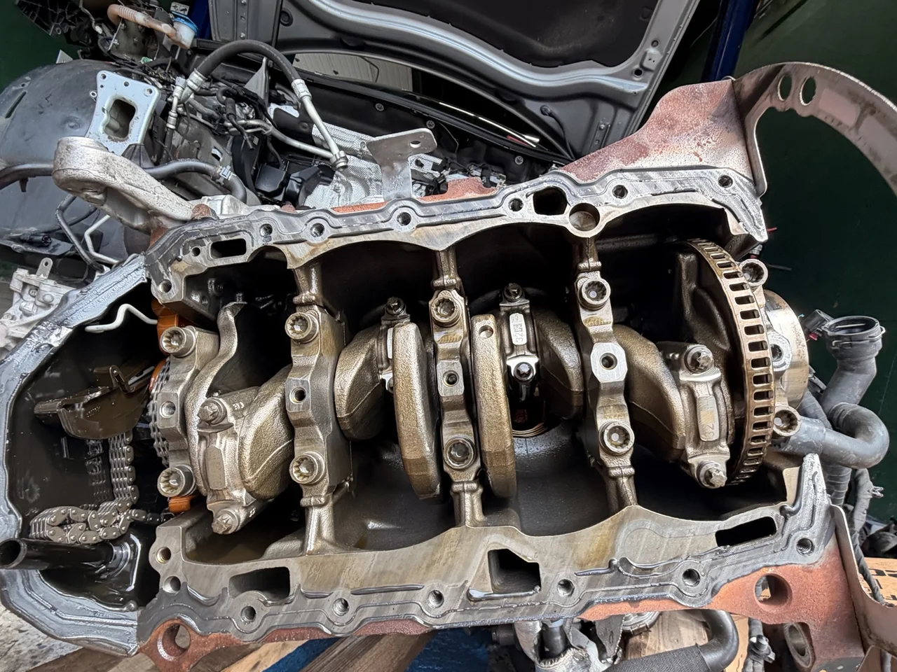 Technician working in an engine bay