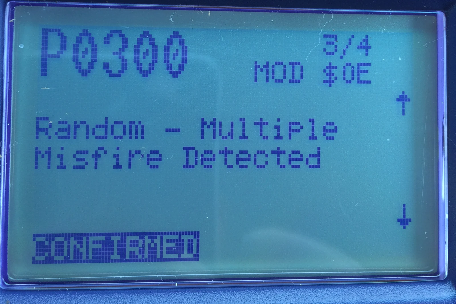 OBD scanner screen displaying the P0300 multiple-misfire trouble code.