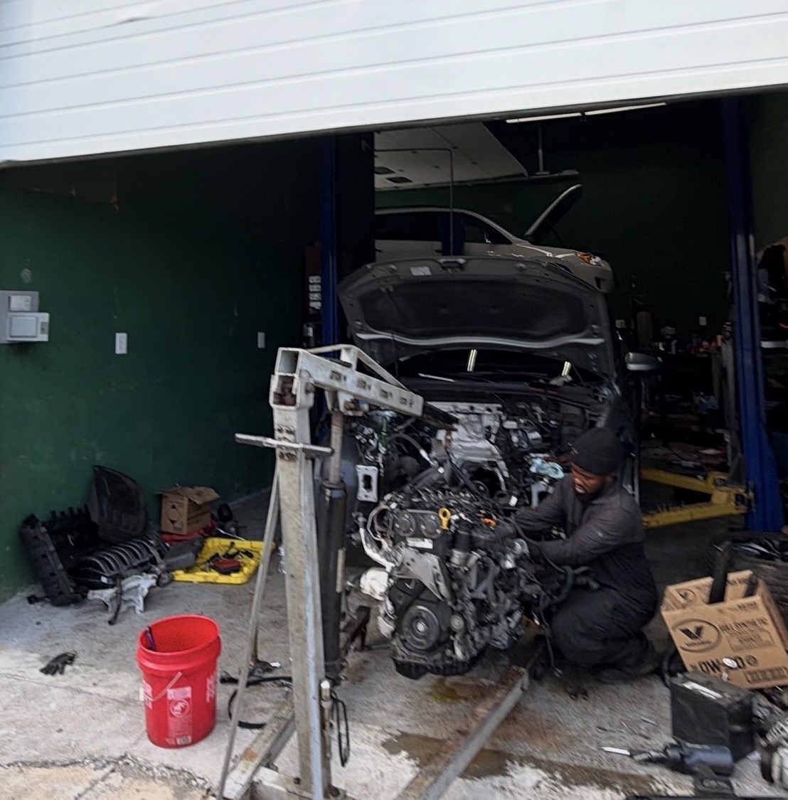 Vehicle engine being serviced at M&A